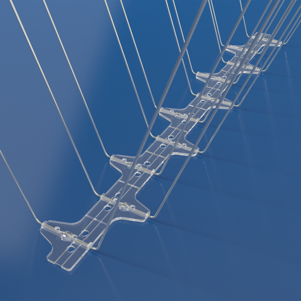Close-up of a BC Bird Spikes 20G spike tip against a blue background, showing the 1.4mm 304 stainless steel construction