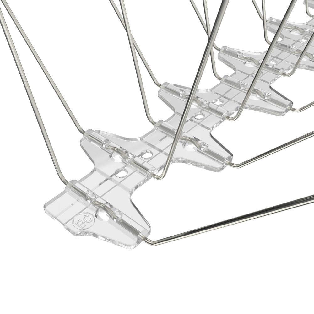 Close-up of BC Bird Spikes 32L stainless steel spikes and easy-snap adjustment grooves