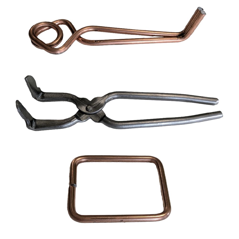Putange Mole Trap consisting of three parts: the steel trap, trigger mechanism, and setting tool, ideal for professional mole trapping.