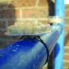 Bird Free Fire Gel secured to a metal pipe using magnetic base attachment
